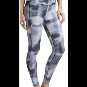 Athleta leggings with front inside hidden stash pocket.